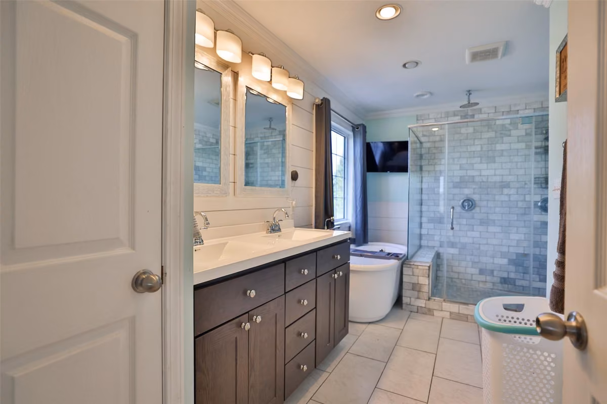 Bathroom with freestanding tub and double vanity